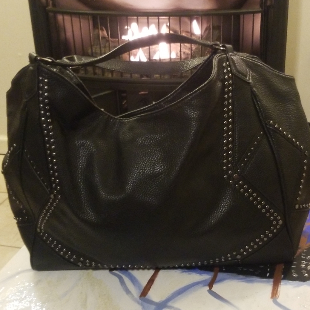 Such a big and spacious studded purse